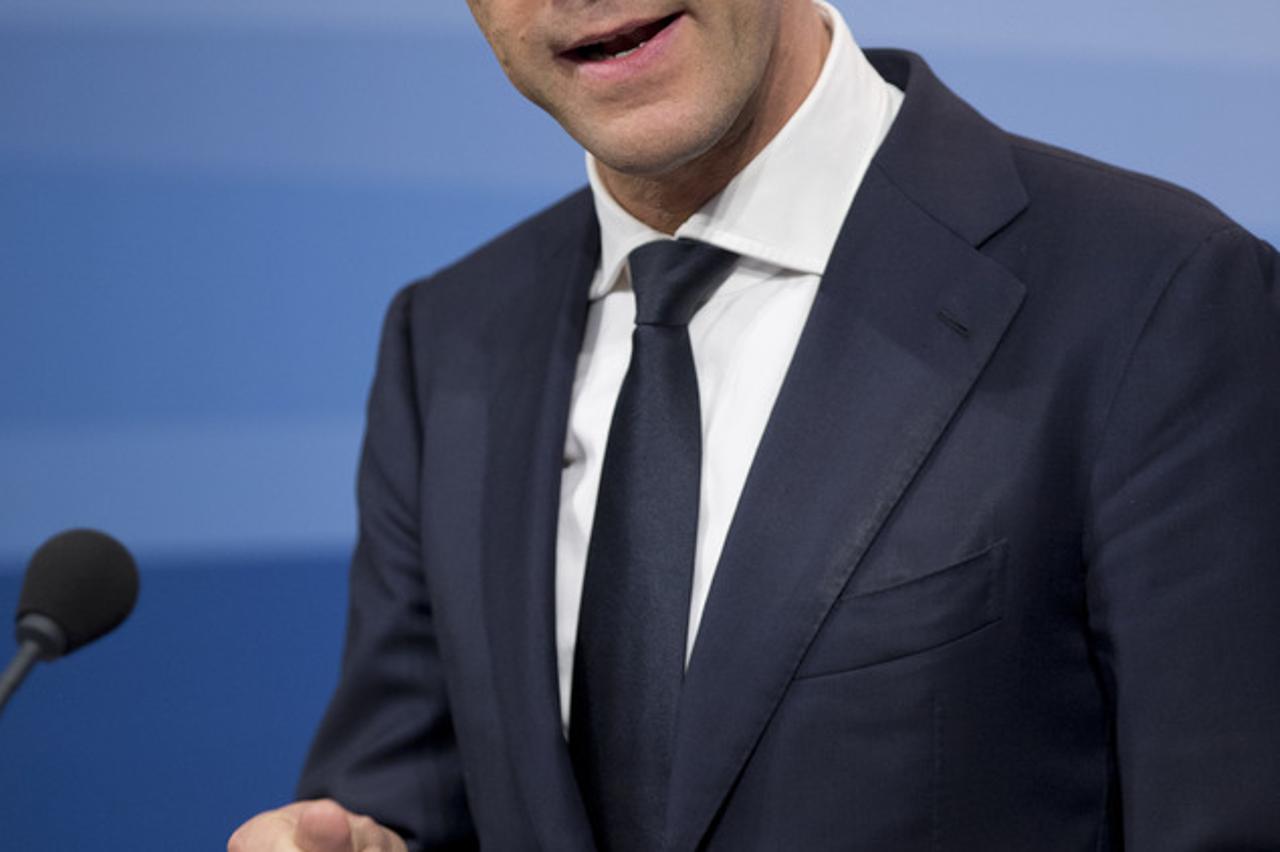 Dutch Prime Minister Mark Rutte gestures during a press conference after a cabinet meeting in The Hague, Netherlands, Friday, Jan. 29, 2016. The Dutch Cabinet held its weekly meeting and decided to extend its campaign of air strikes against the Islamic St